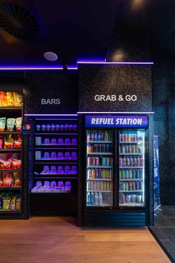 Retail store with refrigerated drinks and supplements
