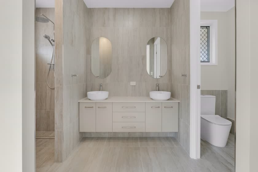 Finished bathroom with a double vanity